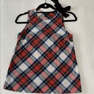 Plaid sleeveless bow top.